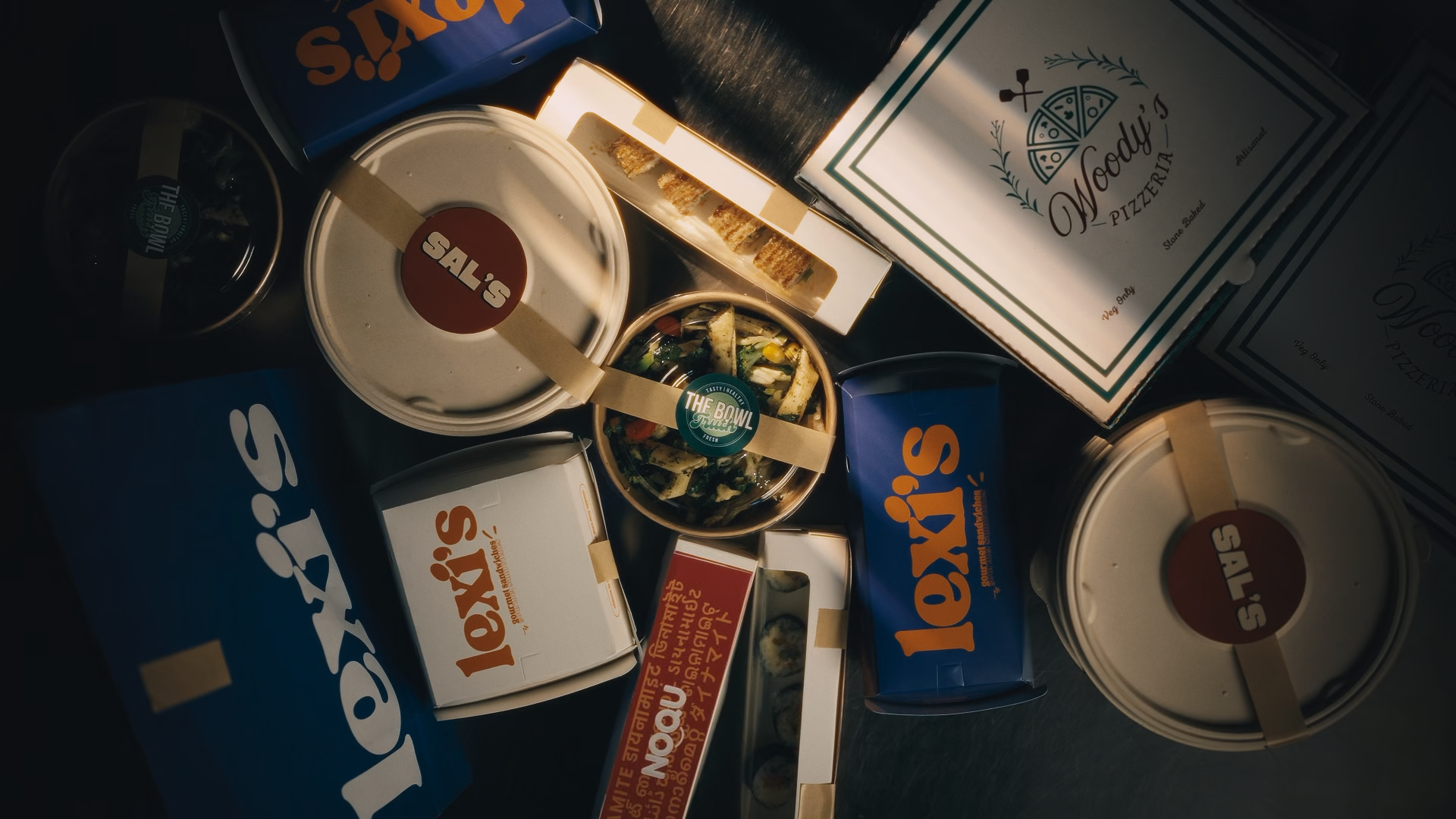 Student food brands — Sal's, Woody's Pizzeria, The Bowl, Lexi's, and Noon
