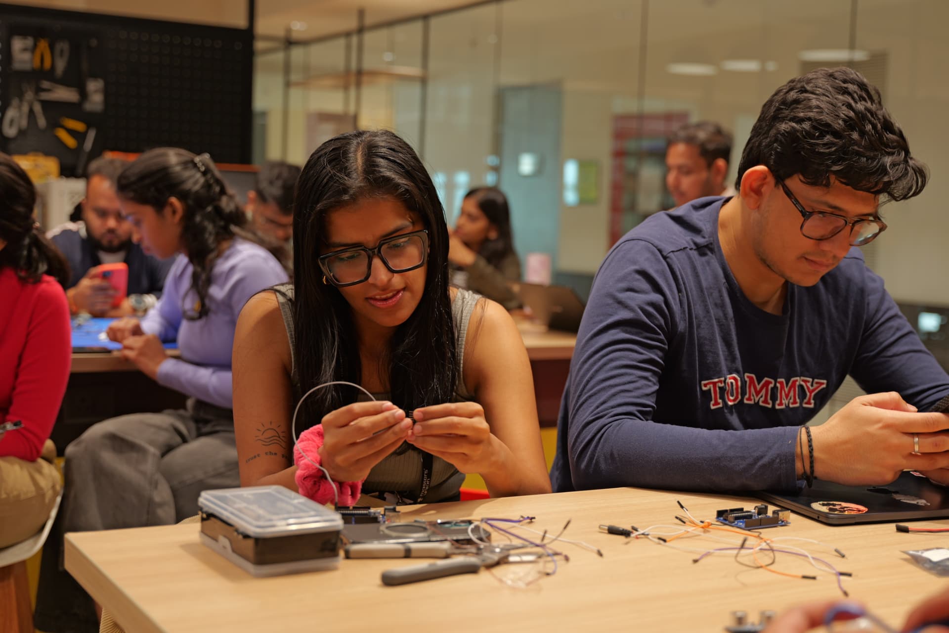 Students working in the Makers Lab with circuits and tools