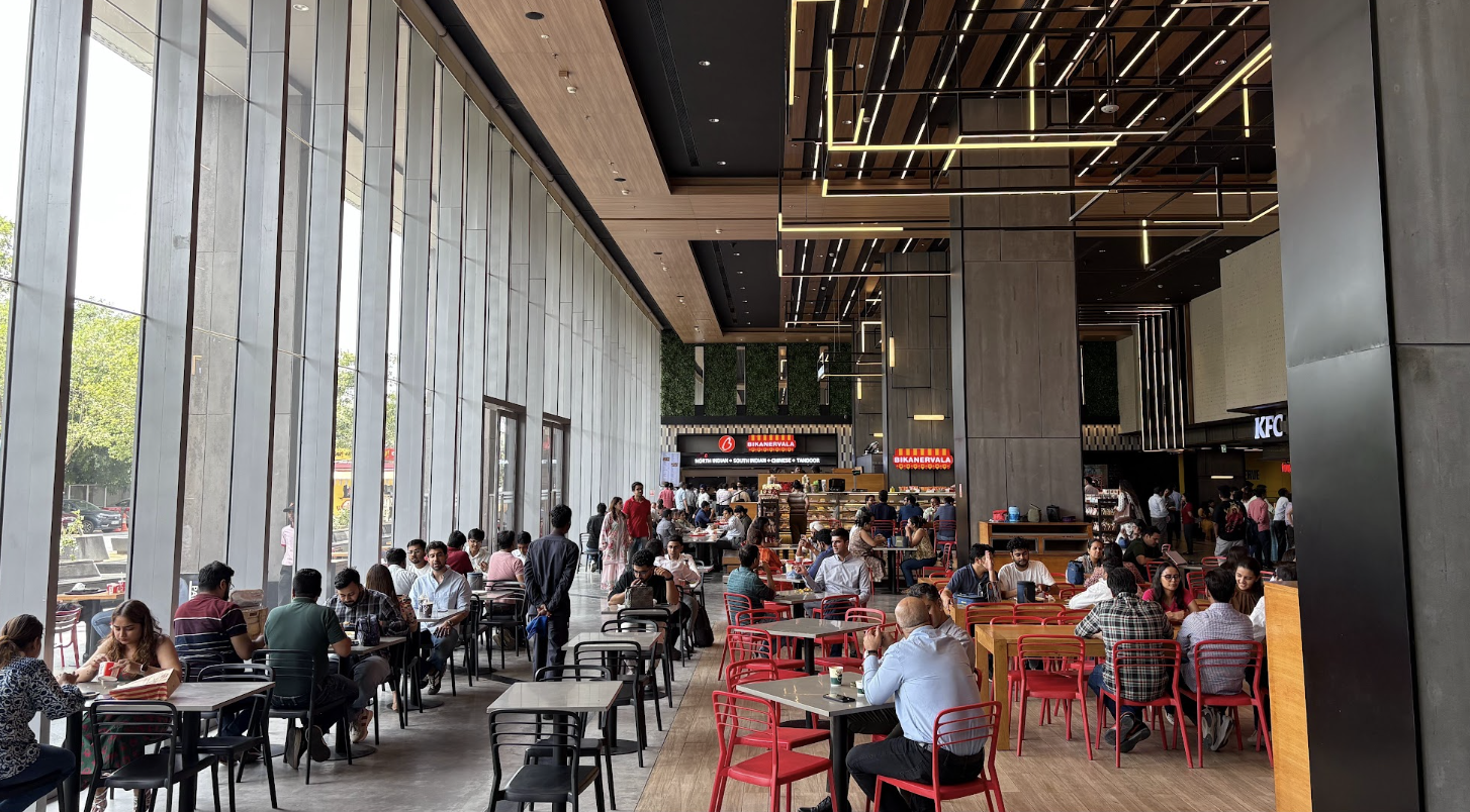 Students having lunch in the Masters' Union campus food court